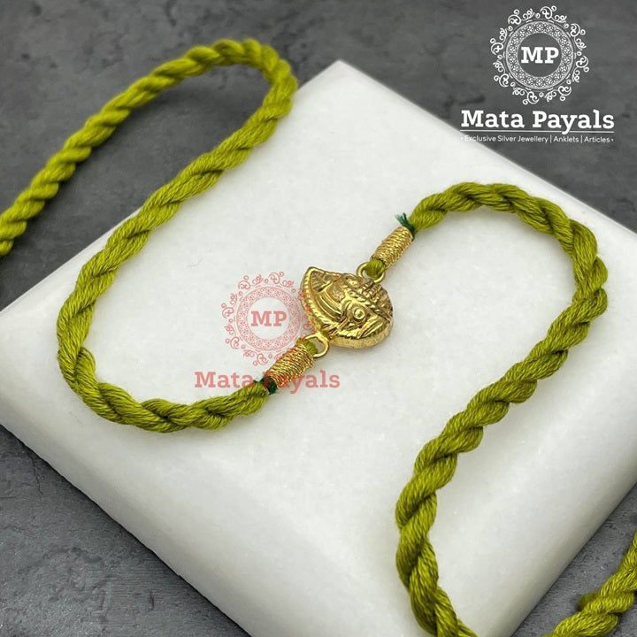 Impeccable Gold Plated Silver Rakhi