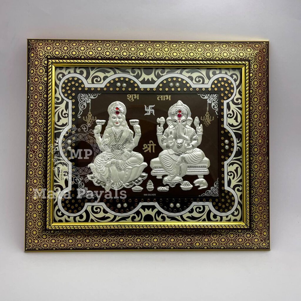 Mesmerizing Shri Varamahalakshmi & Ganapathi Silver Frame